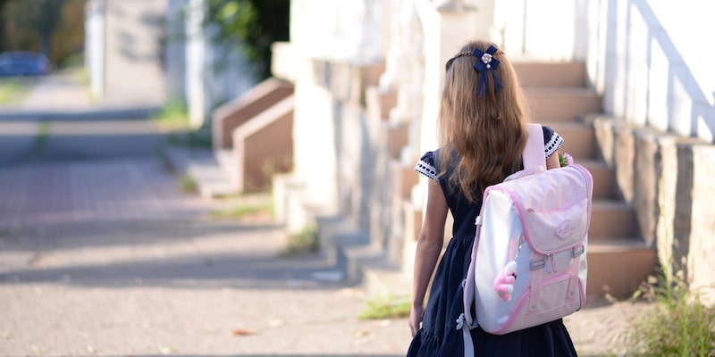 a girl with school bag - problem solving